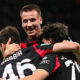 Gabbia, Camarda e Joao Felix si abbracciano dopo un gol del Milan a San Siro in campionato