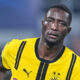 Serhou Guirassy in campo con il Borussia Dortmund durante una partita di Champions League
