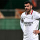 Theo Hernandez amareggiato dopo un gol subito dal Milan a Firenze