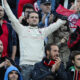 Tifosi del Milan sugli spalti di San Siro mentre seguono una partita