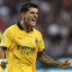Pulisic esulta dopo aver segnato il gol dell’1-0 in Udinese-Milan
