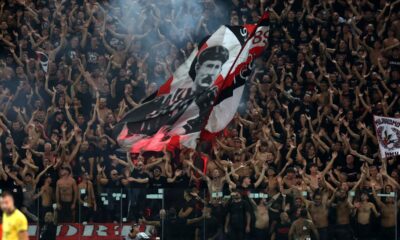 Curva Sud Milano in trasferta al Bluenergy Stadium di Udine durante Udinese-Milan