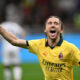 Luka Modric esulta per il primo gol con il Milan a San Siro nella sfida contro il Bologna.
