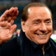 Silvio Berlusconi sorride a San Siro mentre saluta i tifosi del Milan